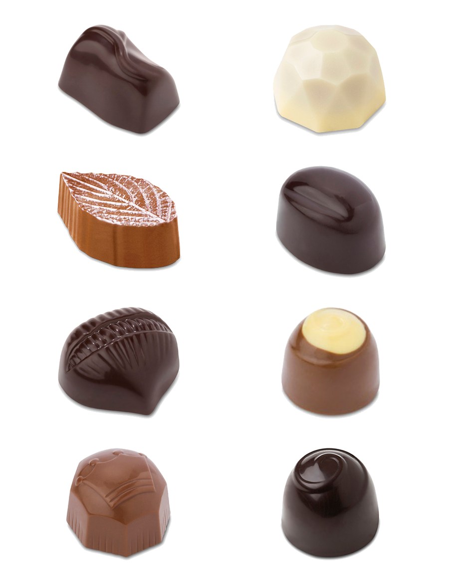Huit pralines de la gamme Private Label, chocolat noir, lait et blanc